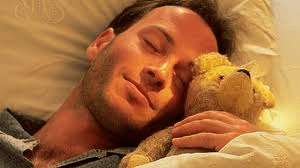 adult with teddy bear